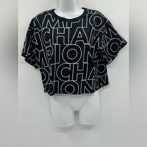 Women's Champion Heritage Cropped Tee, All Over Logo Big Block Text Outline Blac